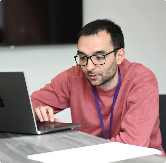 wise employee working on a laptop