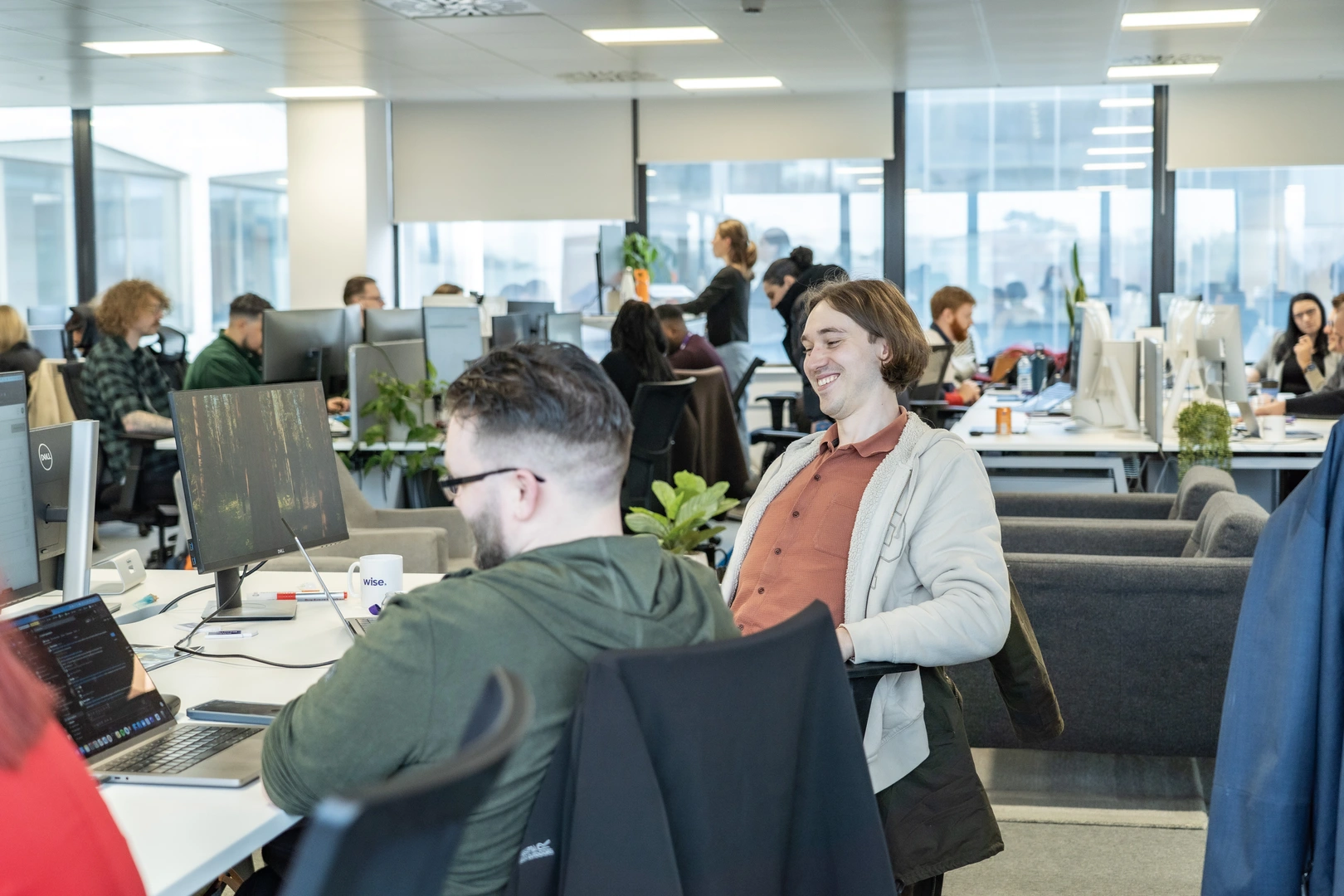 Employees going about their day in an office space