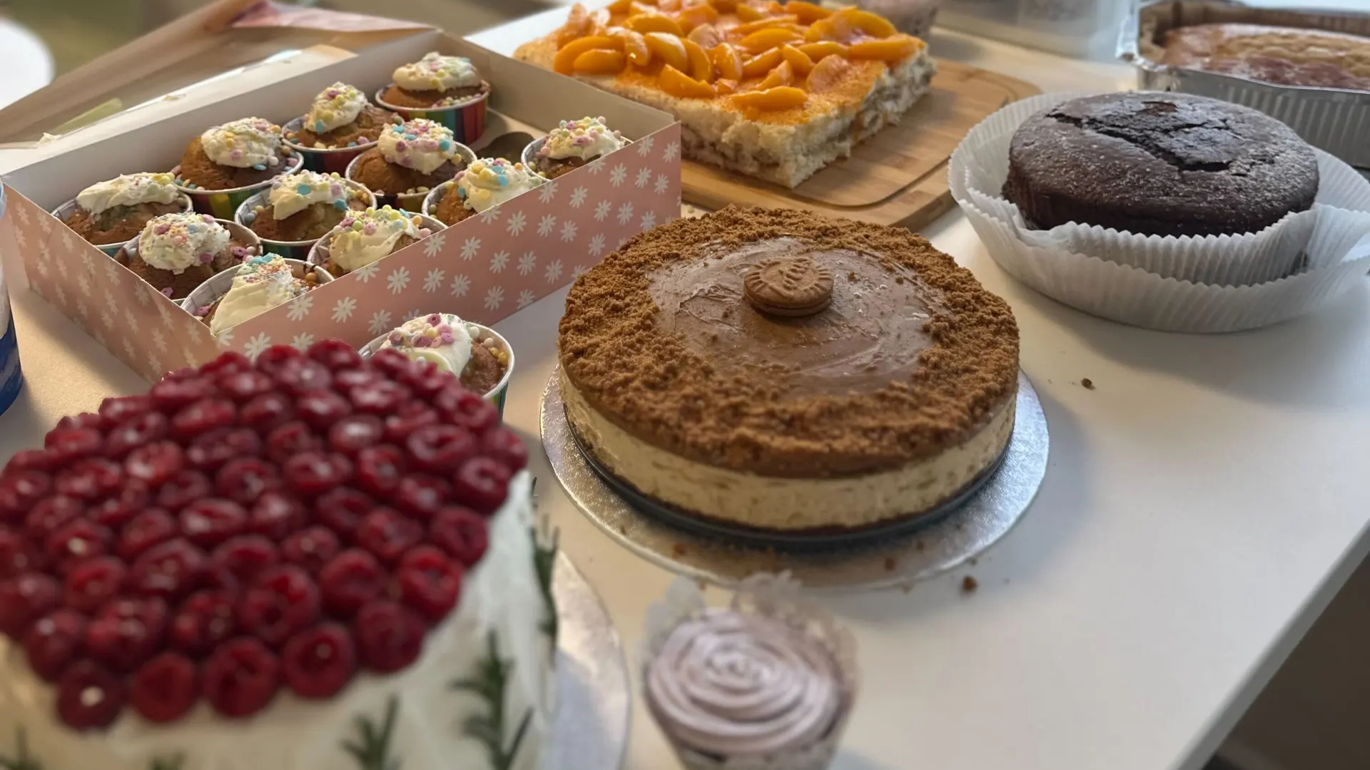 A selection of cakes laid out on a table